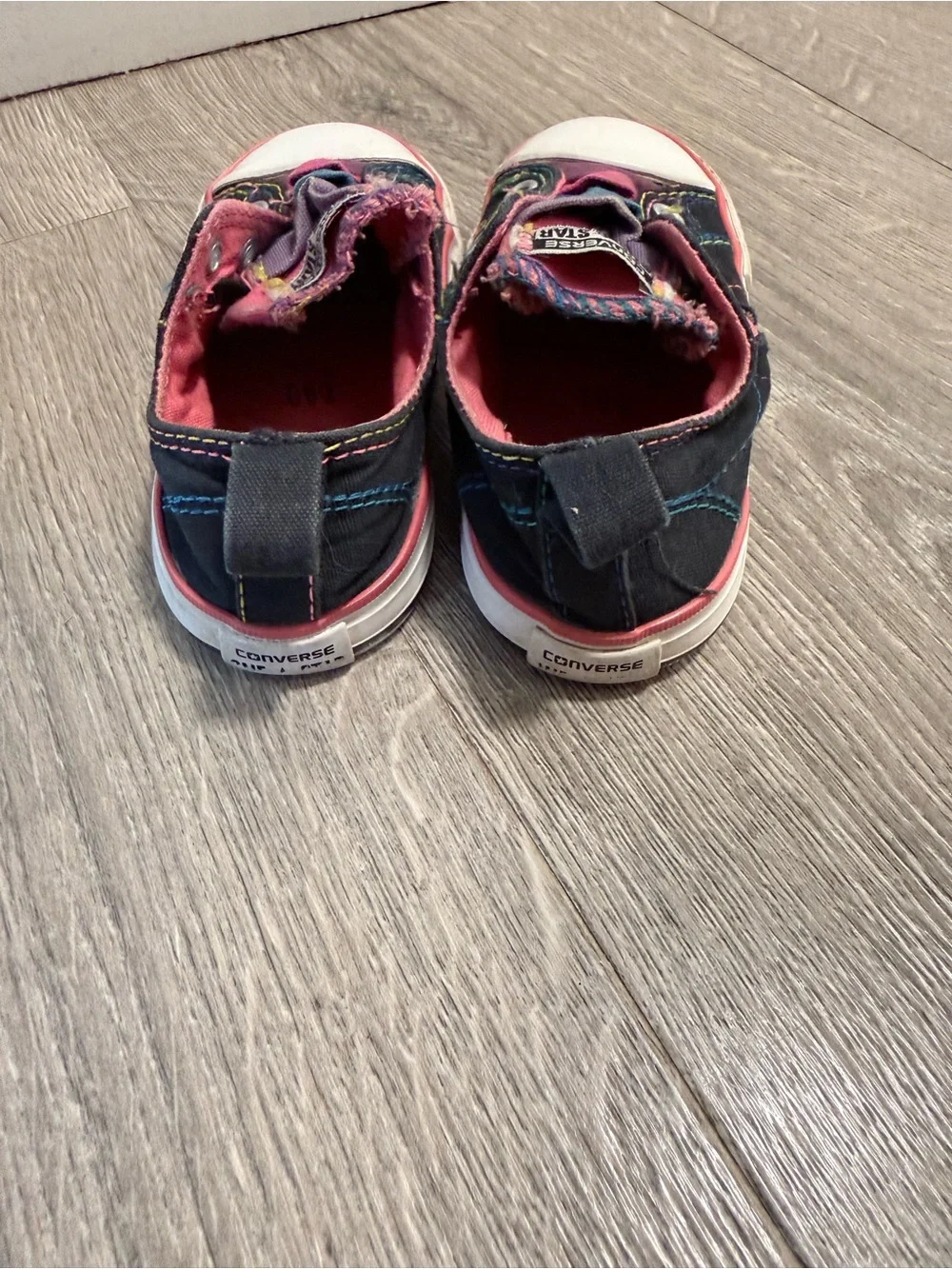 Sold Converse Kids One Star Slip-On Sneakers in Black with Pink and Blue Accents